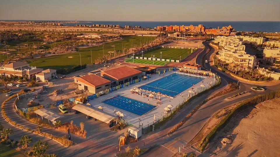 Aerial view of Soma Sports Arena with Olympic pools, football pitches and courts
