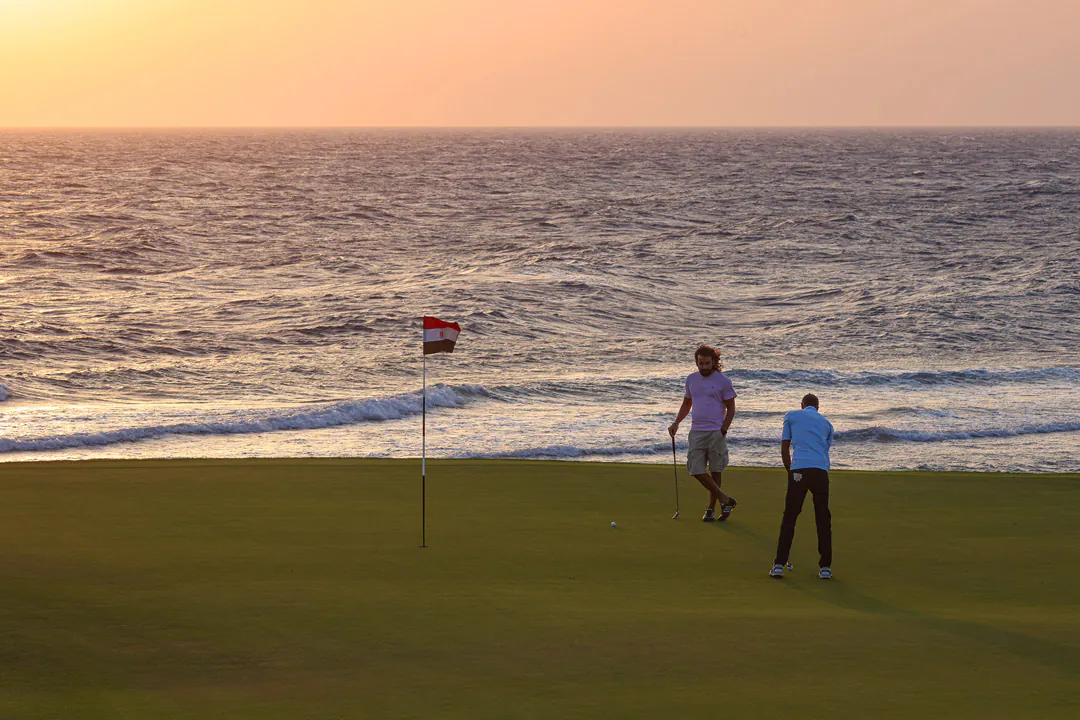 Golfers on the championship course beside the Red Sea at Somabay