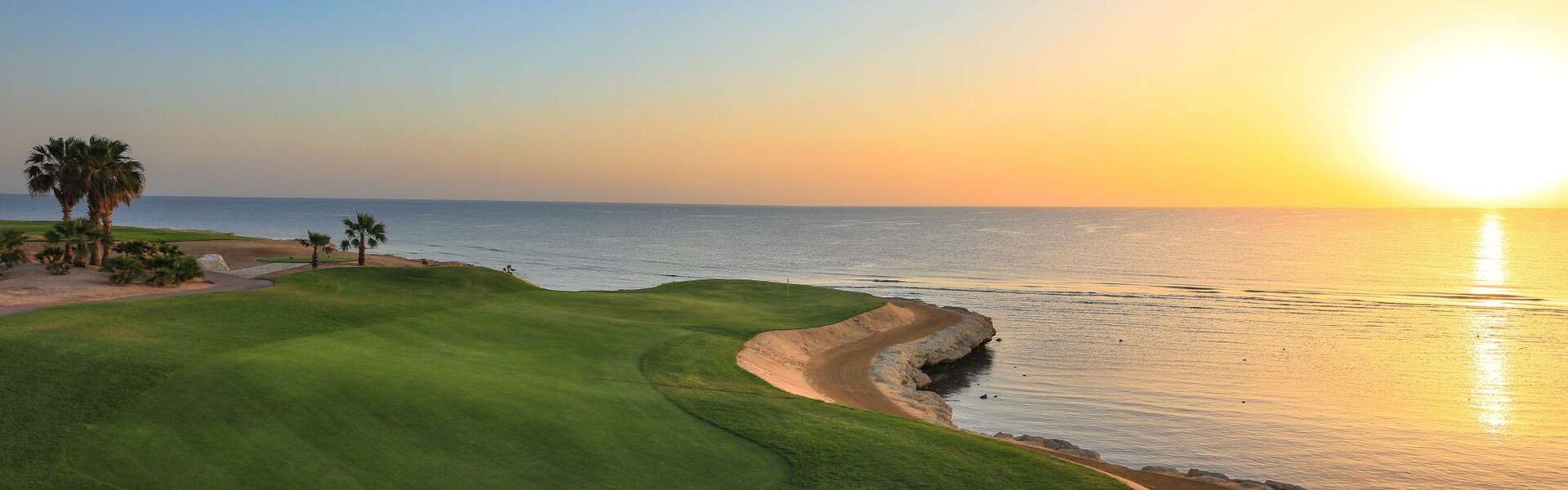 The Cascades golf course meeting the Red Sea at sunset, Somabay